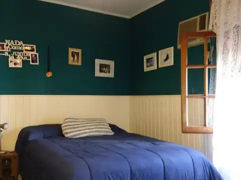 CASA DE PASILLO 2 DORMITORIOS CON PATIO