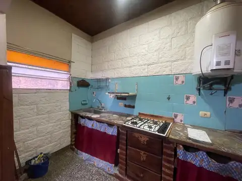 CASA CON LOCAL EN VENTA EN BRAGADO