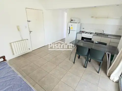 Un dormitorio con balcón terraza