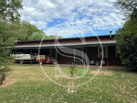 CAMPO 5.8 HECTAREAS CON CASA  Y BOX CABALLOS