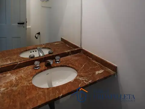 Casa reciclada en las antiguas caballerizas de San Jorge Village