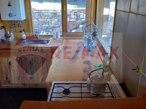 RE/MAX vende complejo cabañas frente río Meliquina