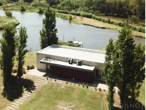 AFG: Lote a Laguna de 887 mtrs 2 con vista al atardecer.