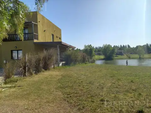 AFG: Lote a Laguna de 887 mtrs 2 con vista al atardecer.