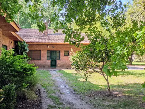 Gran lote de 7,2ha en venta con casas quintas en Loma Verde