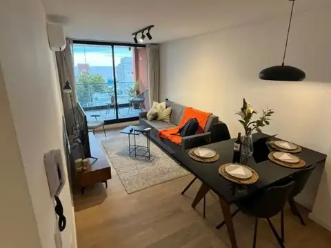 Apartamento de 2 dormitorios, con terraza, vista al mar y cochera.