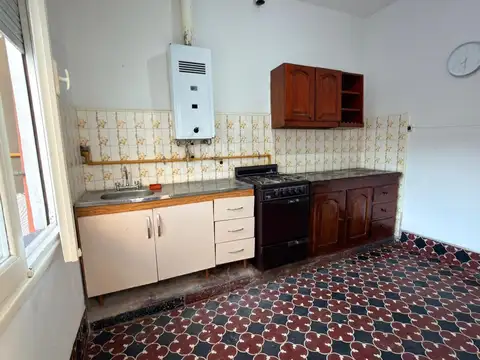 DEPARTAMENTO 2 AMB PLANTA BAJA CON COCHERA Y PATIO