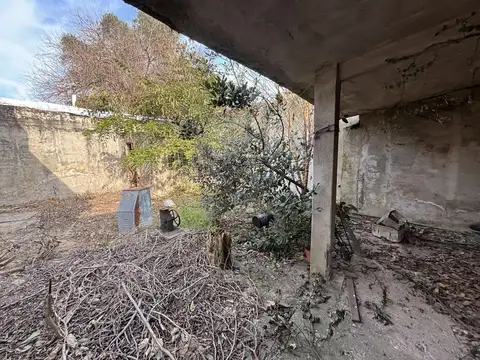 Casa 2 dormitorios con jardín