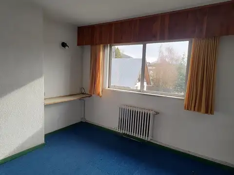 Av. Pioneros y Boock.