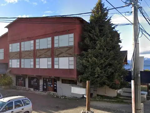 Av. Pioneros y Boock.