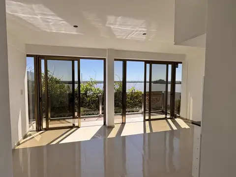 Edificio Frente al Río Uruguay y Puerto Gouchón