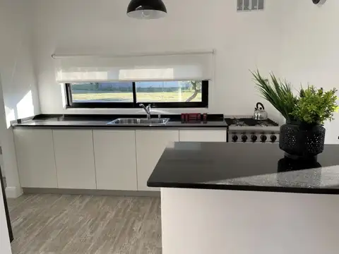 Casa 4 ambientes con 2 baños