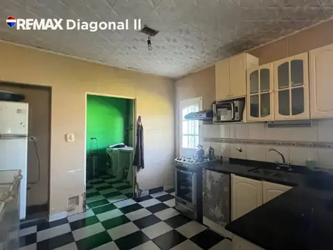 CASA Y LOCALES EN VENTA EN ROMERO