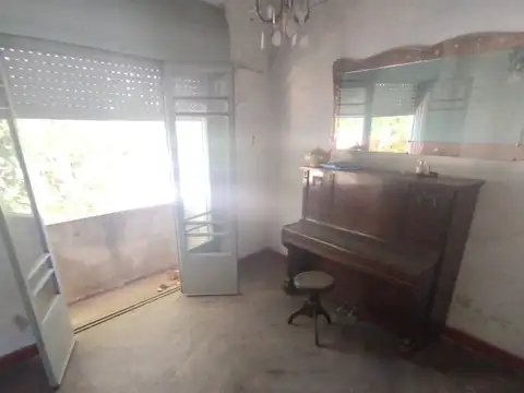 Depto Tipo Casa en Venta en Sarmiento, USD 55.000