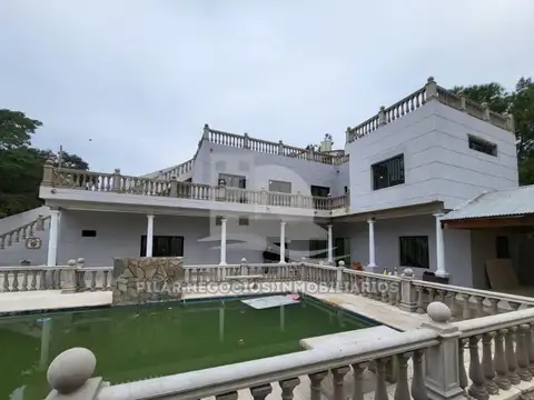 VENDO CASA DE NIVEL 4 DORMITORIOS 3 BAÑOS