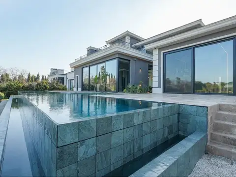 VENTA CASA A ESTRENAR AL GOLF PILAR GOLF