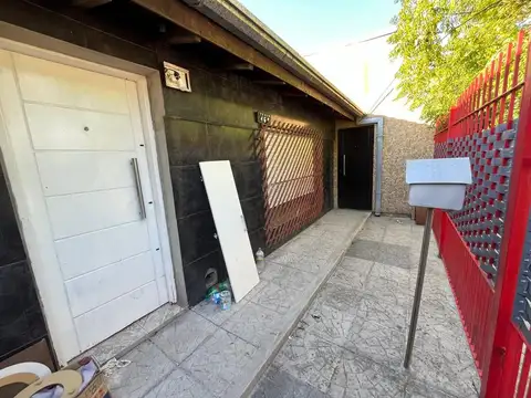 VENTA CASA 3 AMBIENTES QUINCHO Y COCHERA LIBERTAD