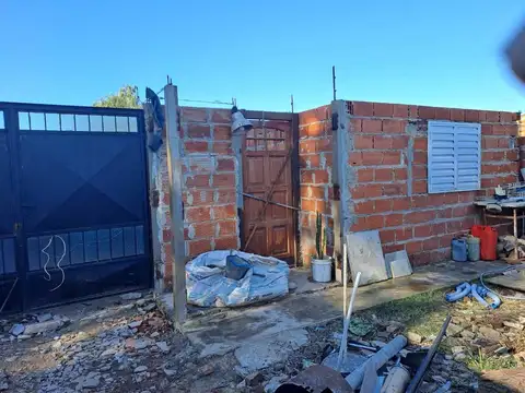 VENDO TERRENO Y CASA A TERMINAR SU CONSTRUCCION