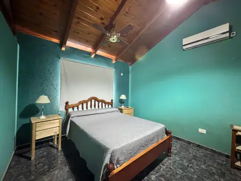 VENTA - Casa de dos dormitorios, cochera, jardín y pileta - Playa Mansa, Arroyo Seco.