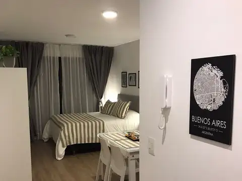 Amoblado balcòn frente