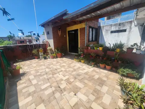 Casa con quincho completo en terraza