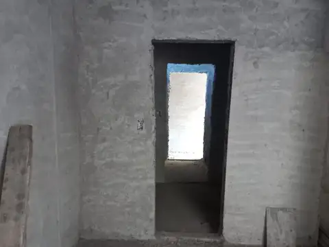 VENTA LOTE CON CASA EN SEMICONSTRUCCION