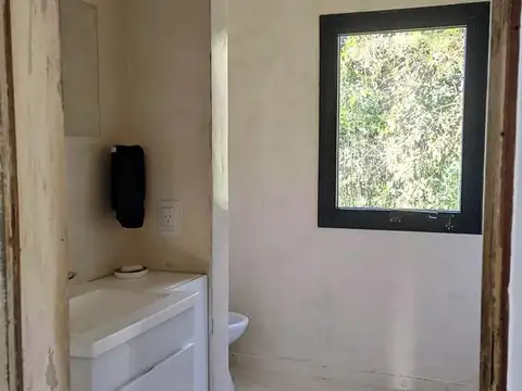 Casa 2 ambientes con 2 baños