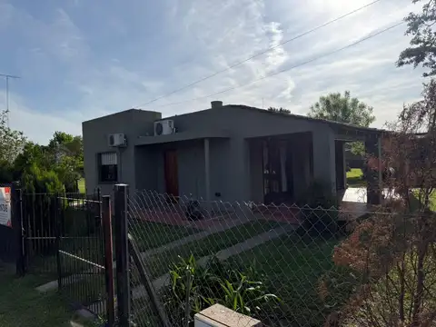 CASA EN VILLA LIA, DOS CUARTOS, PARQUE.