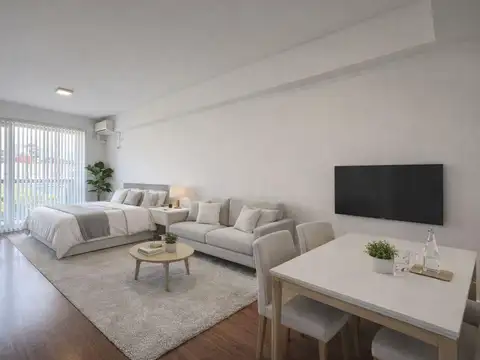 Monoambiente Moderno con Balcón y Vista Abierta