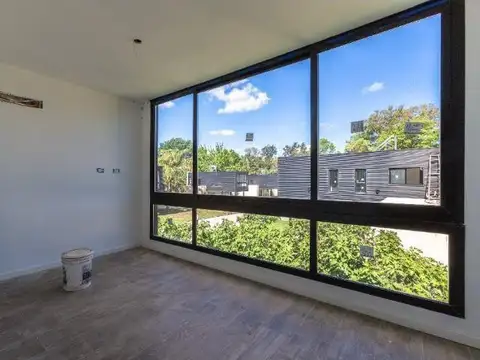 VENTA- CASA DE DOS DORMITORIOS CON COCHERA. FUNES. BARRIO MARIA AUXILIADORA