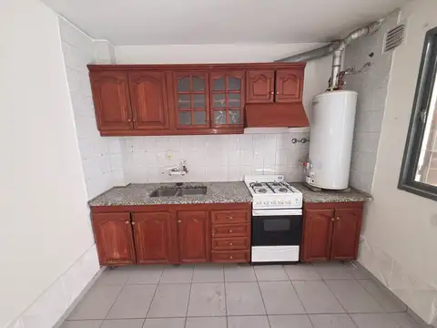 DPTO 3 DORMITORIOS Y COCHERA PLANTA BAJA Y PATIO