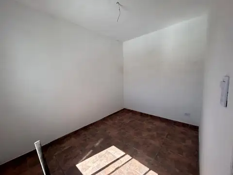 Castagnino 1600. Departamento dos dormitorios, planta alta.