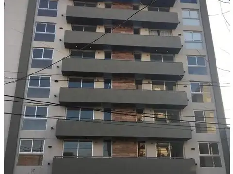 DEPARTAMENTO DOS AMBIENTES AL FRENTE.