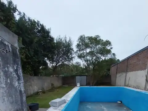 Casa 7 ambientes con 2 baños